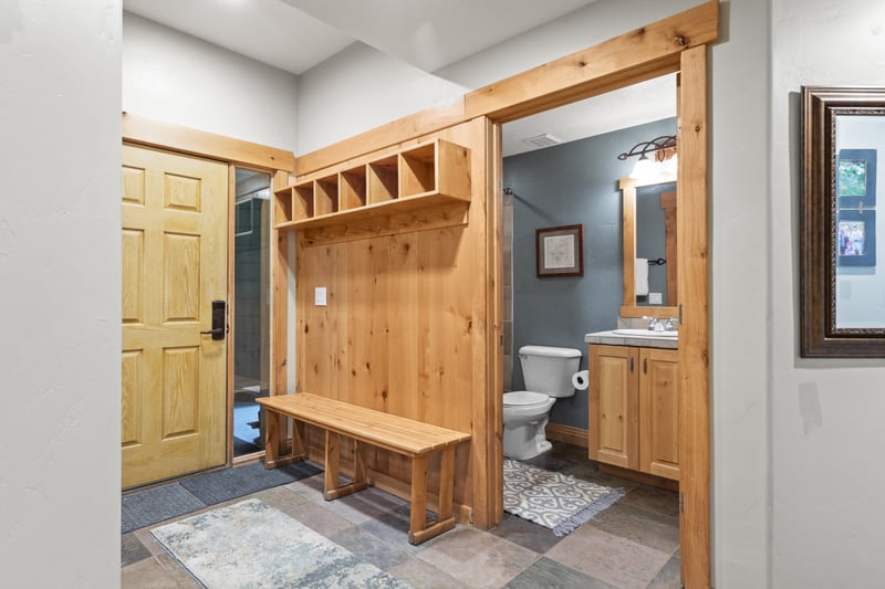 Drop your gear in the spacious mudroom with built-in bench and storage.
