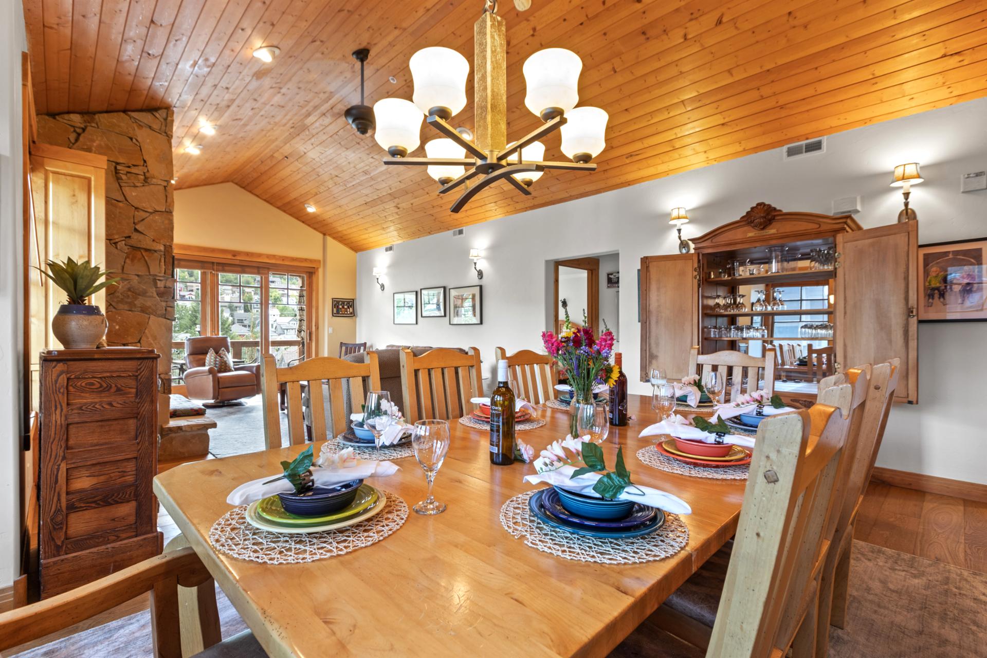Dine in mountain style with high-back chairs, warm lighting, and plenty of room to serve up favorites.