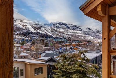 Soak in mountain scenes and snow-covered rooftops from this elevated perspective.