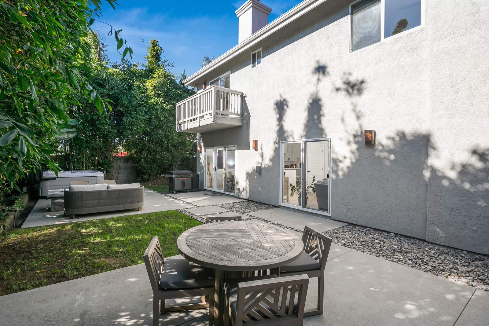 Patio space offers room for outdoor dining and lounging, extending your living space outside.