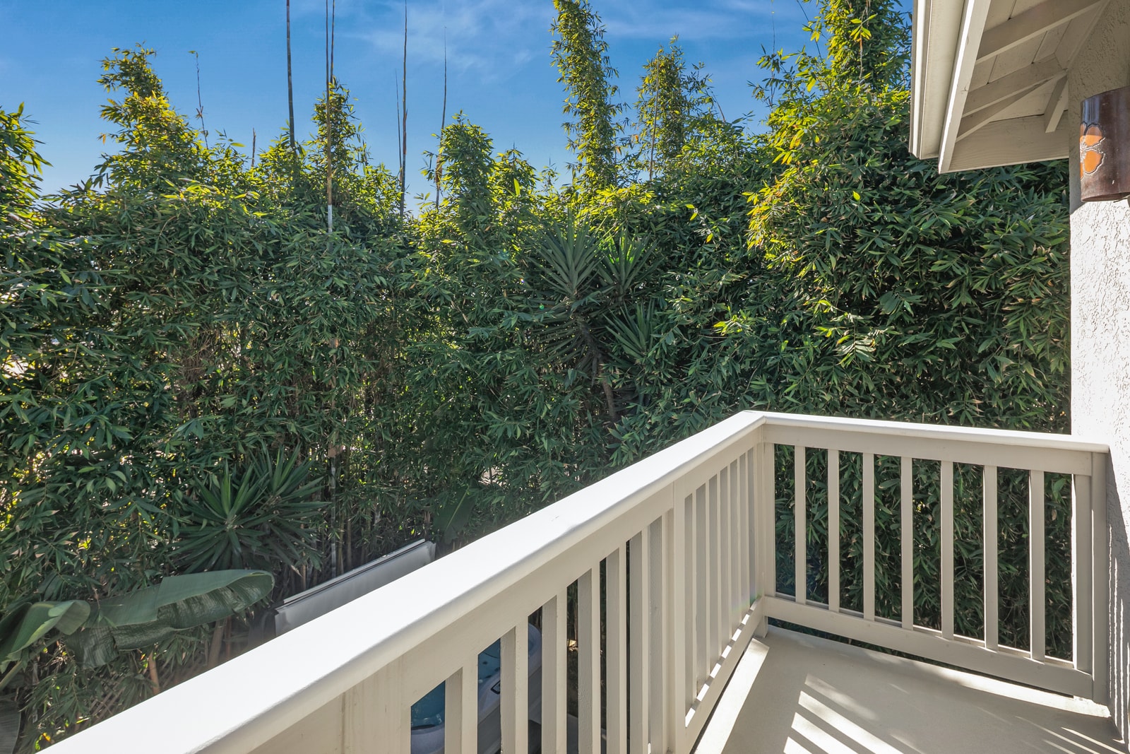 This balcony space invites quiet moments outdoors, whether you are enjoying fresh air or a short break.