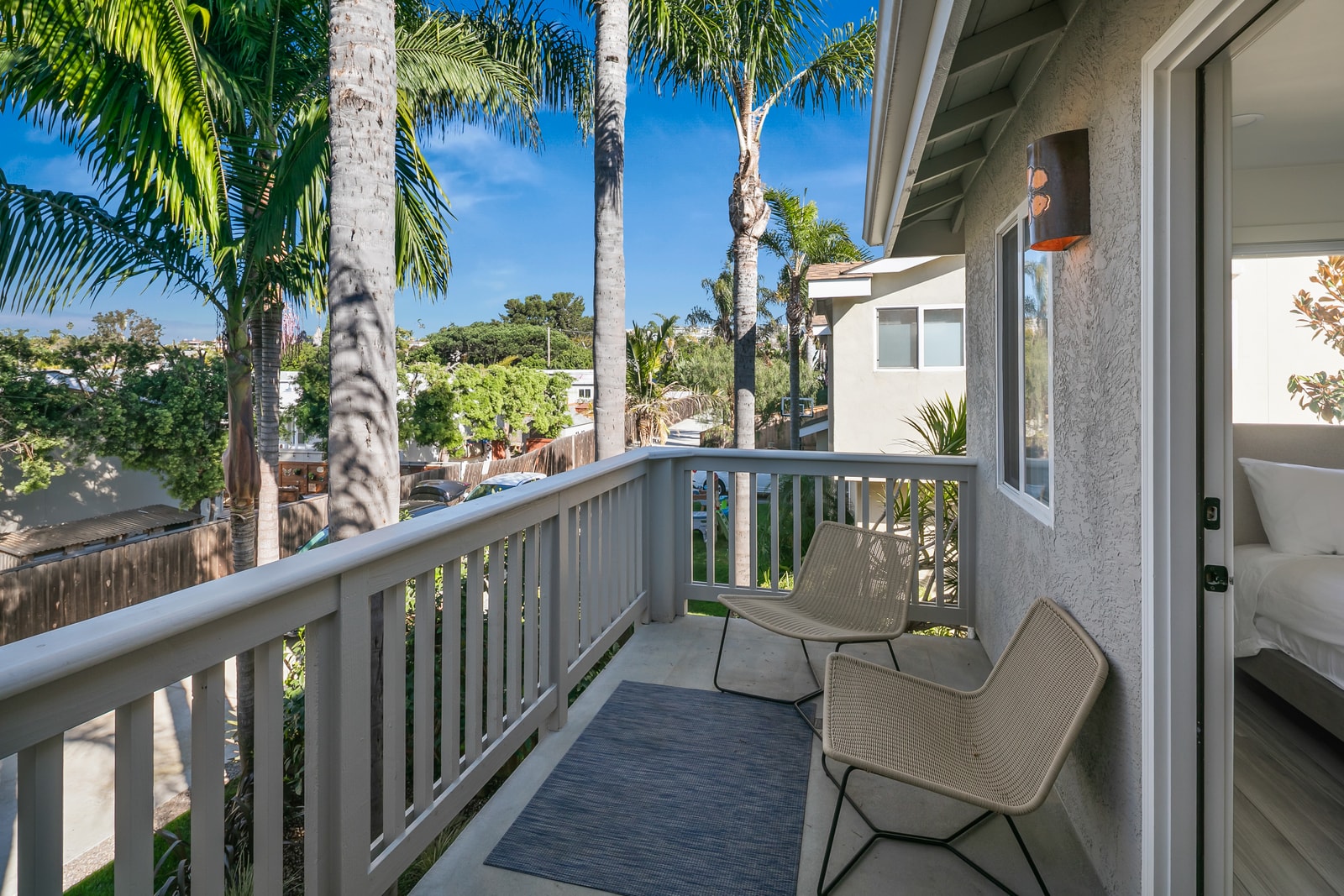 Another bedroom with a private patio gives everyone their own little space to retreat.