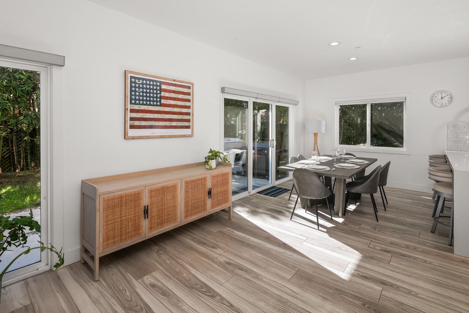 A buffet and open dining layout make serving family style meals simple, encouraging long conversations after dessert.