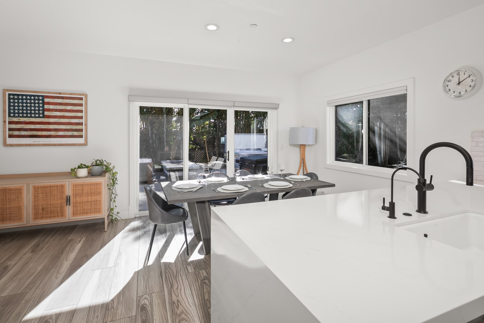 Pull up a barstool and enjoy morning coffee at the island while staying connected to the main living area.