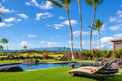 Lush tropical grounds surround the property with the Pacific ocean as the backdrop