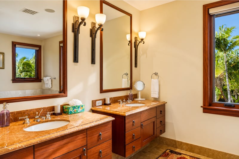 The dual vanities in the primary bath offer ample counter space