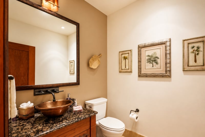 The main home features a comfortable half bath for convenience