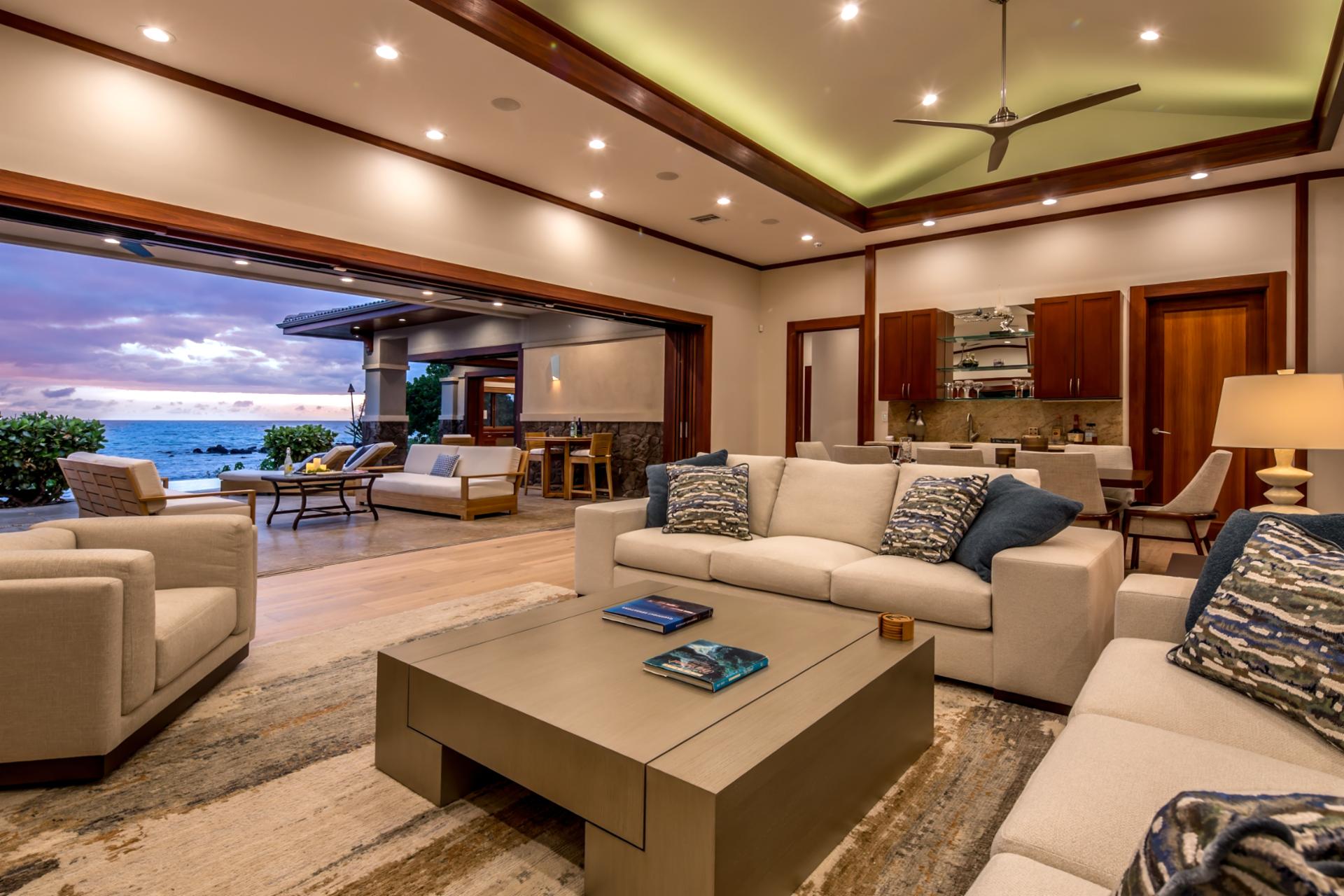 Vaulted ceilings, plush seating, and open sightlines make the living room perfect for group gatherings.