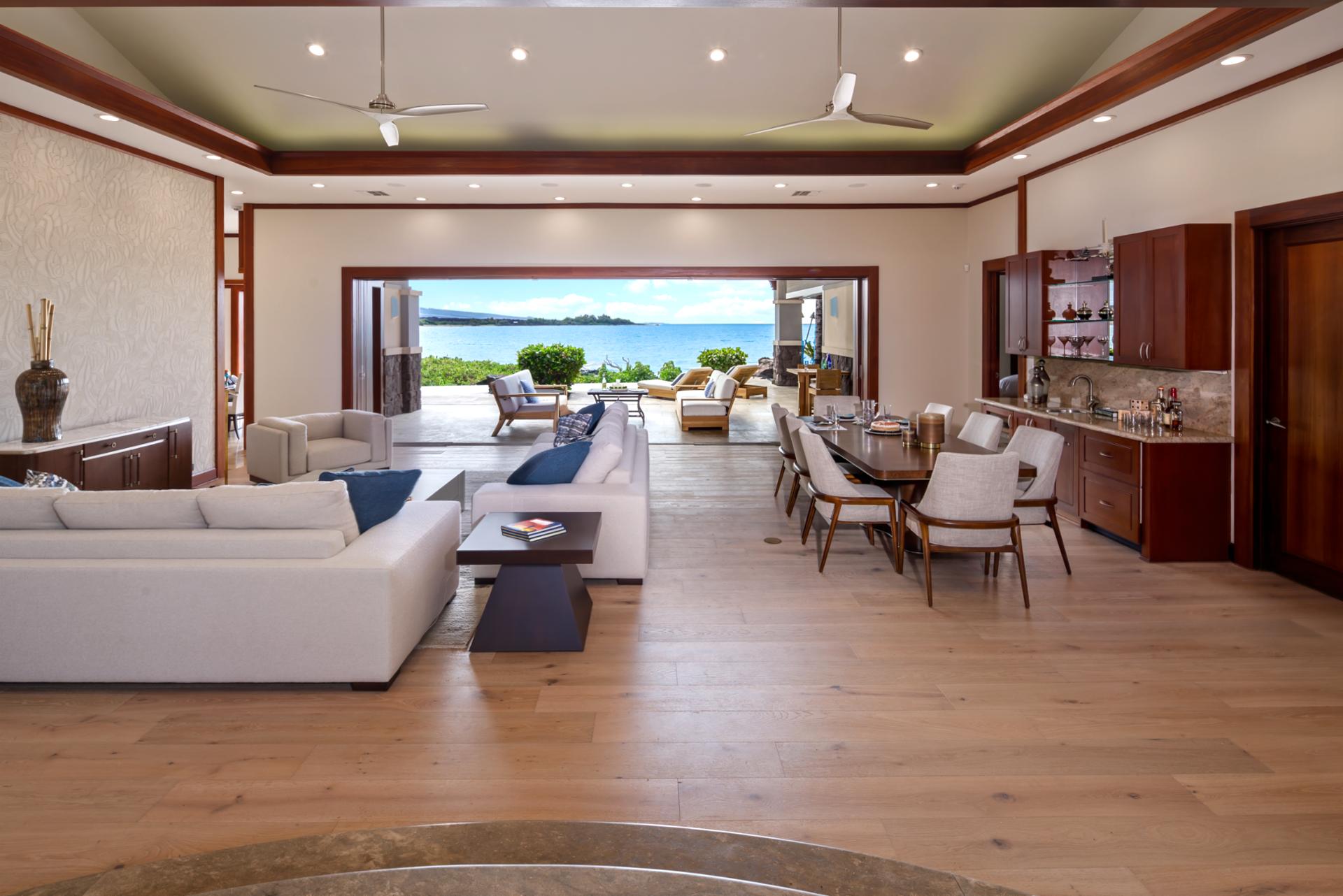 Living area offers elegant island design with ample space to unwind and reconnect.
