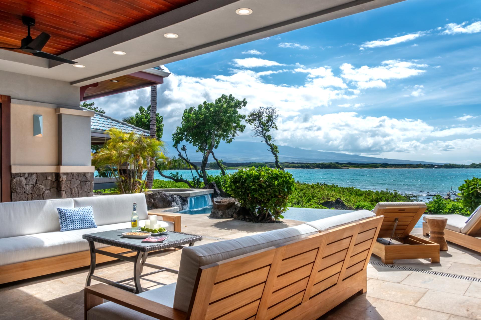 Relax on the shaded patio while enjoying uninterrupted views of the coast.