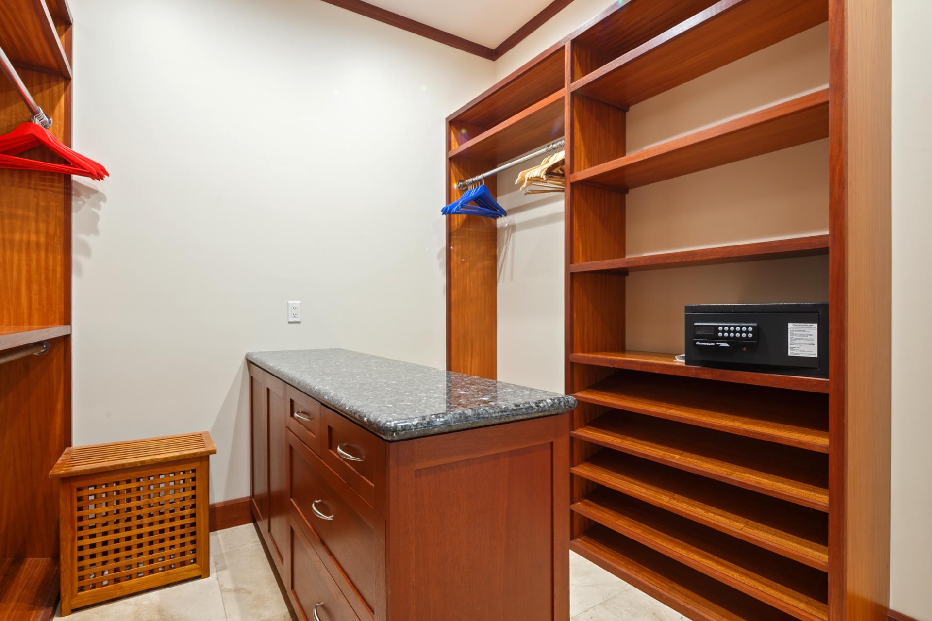 The walk-in closet and dressing area in the primary suite offer ample storage.