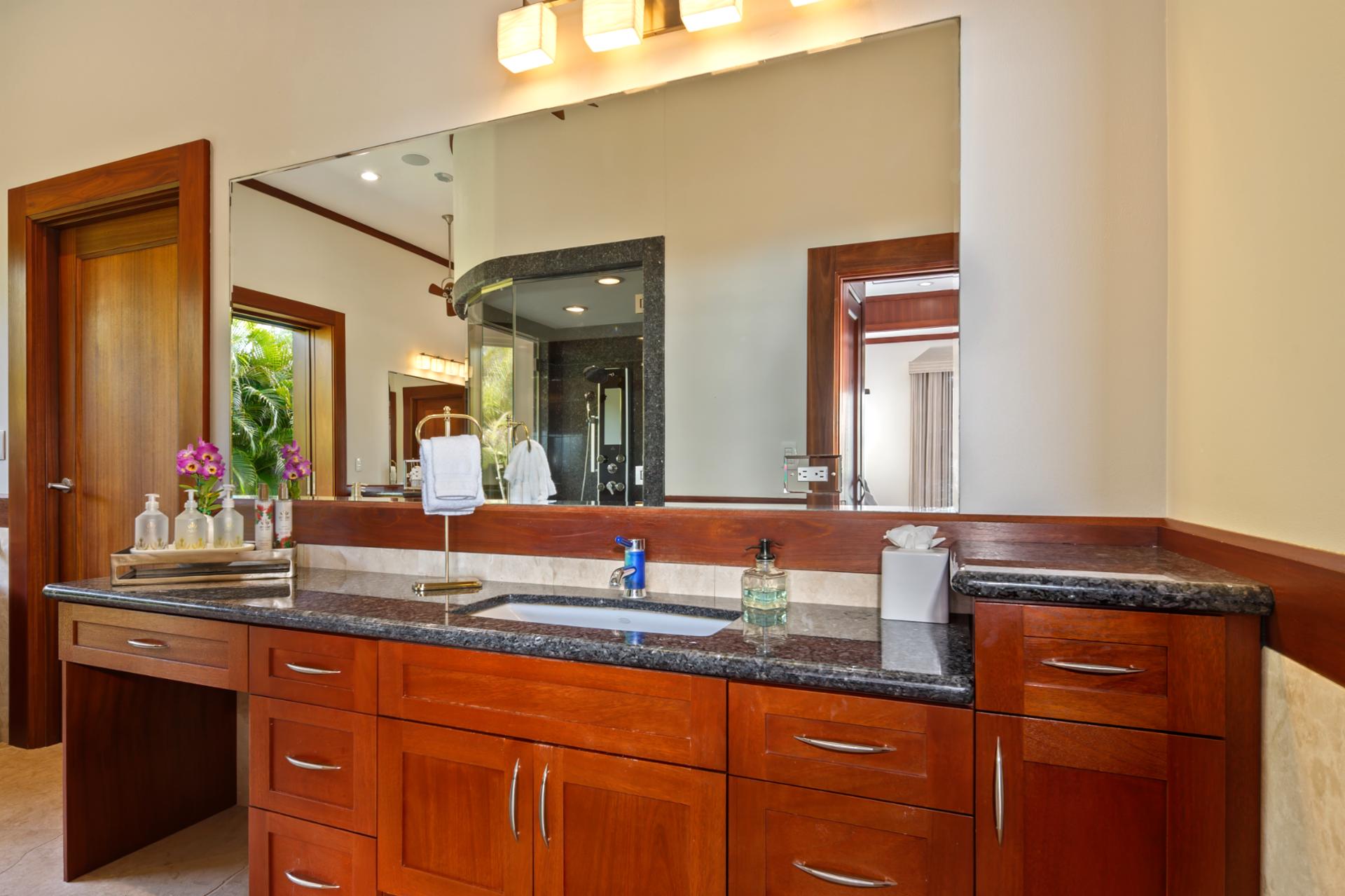 Double vanities and custom tile make your ensuite bath as luxurious as the bedroom itself.