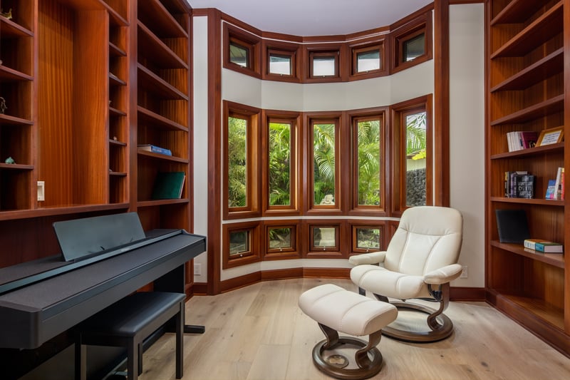 Your entertainment room includes full theater seating, custom walls, and surround sound.