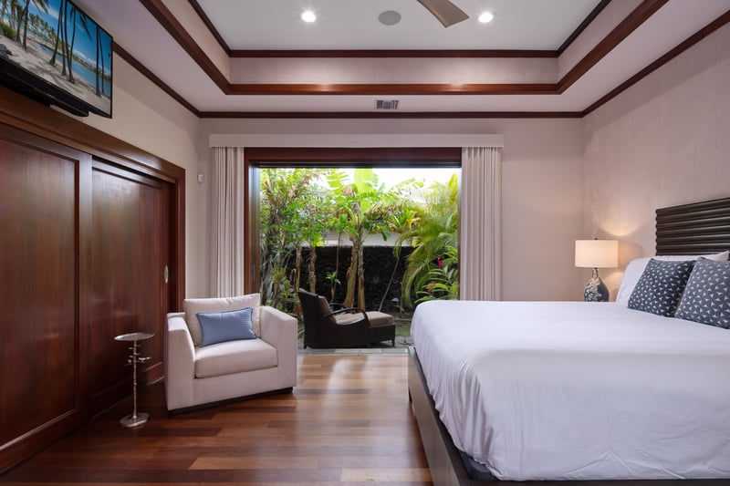 The Second King suite offers comfort and privacy with a plush bed and lounge seating.