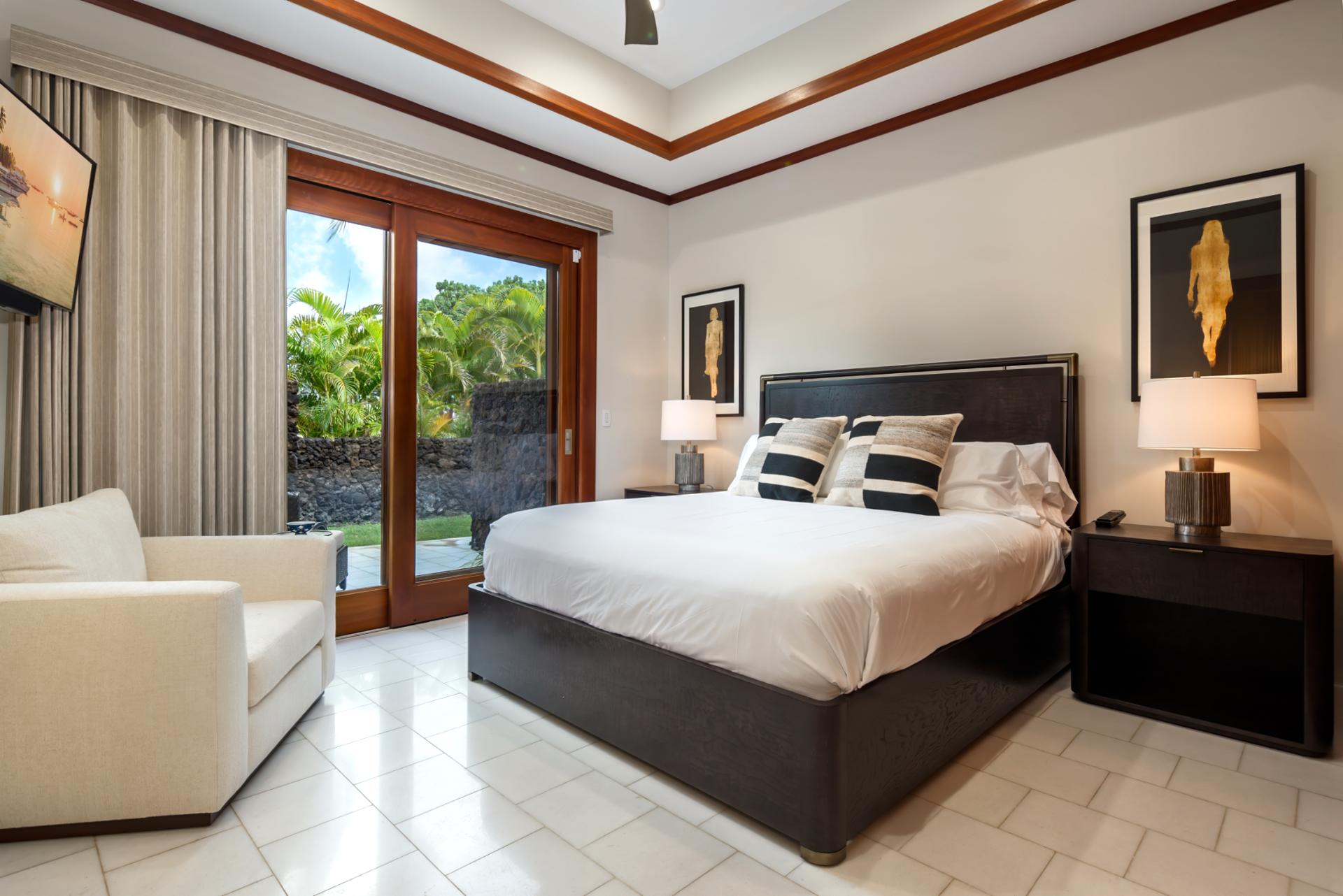 Guest bedroom with soft tones and modern art is ideal for a peaceful night's rest.