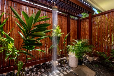The outdoor rainfall shower encapsulates the island experience and is the perfect place to wash off sand after a day on the beach