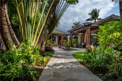 The scenic tropical garden pathway offers peaceful island ambiance