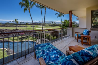 The spacious lanai off the primary bedroom is the perfect place to relax with a bit of privacy