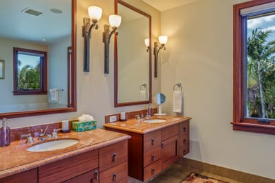The dual vanities in the primary bath offer ample counter space