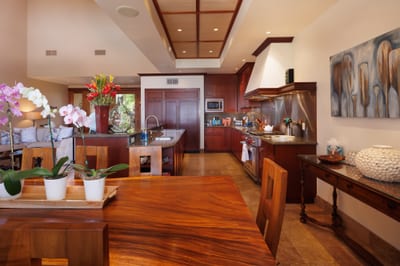 The dining area seats your full group around a large table and recessed lights above