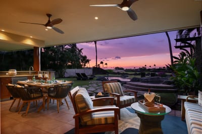 The spacious covered lanai opens to the beautifully kept pool area