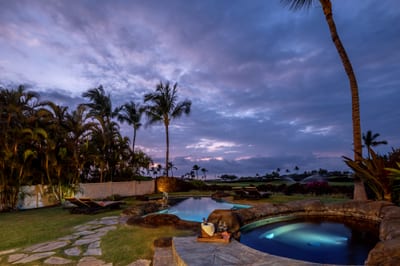Relax poolside while taking in breathtaking sunset views