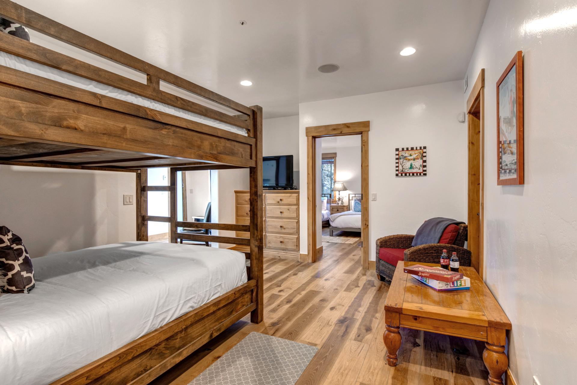 Bonus Queen size bunk sleeping area with TV