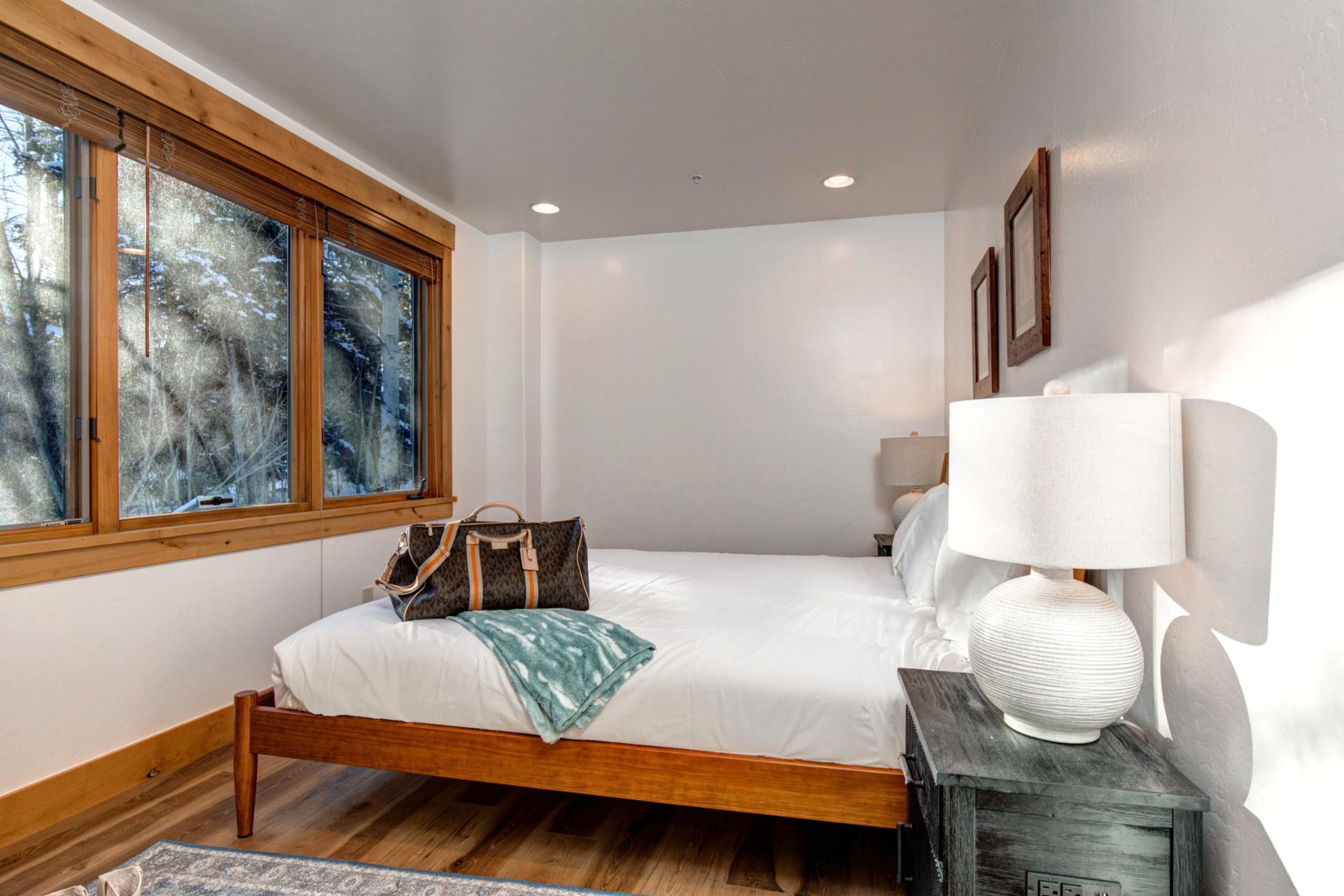 Cozy king bed, wake up to view the wildlife and garden level of the house