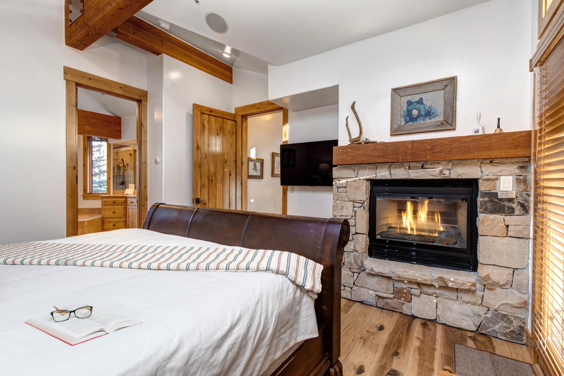 Main bedroom with warming gas fireplace