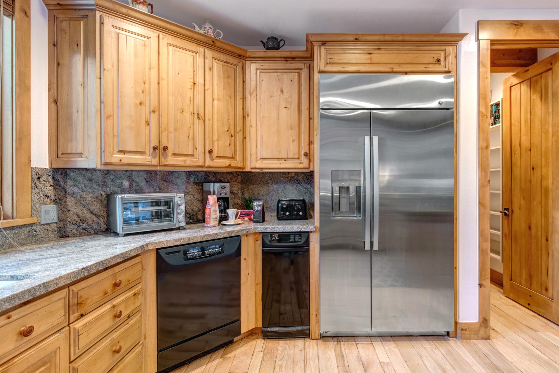 Sleek stainless steel fridge—holds all your favorite foods