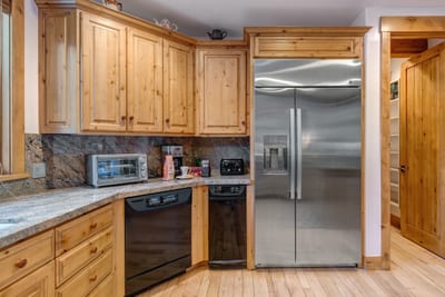 Sleek stainless steel fridge—holds all your favorite foods