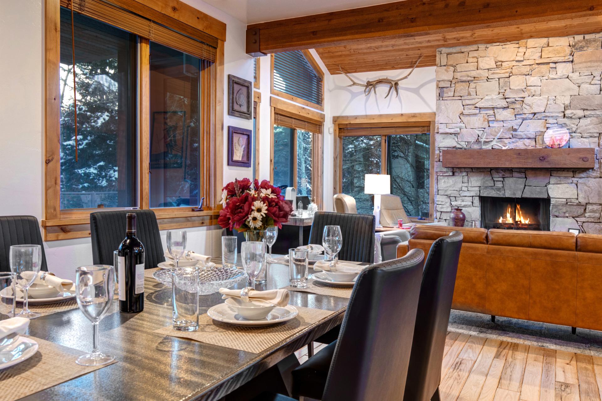 Open space dining with fireplace view