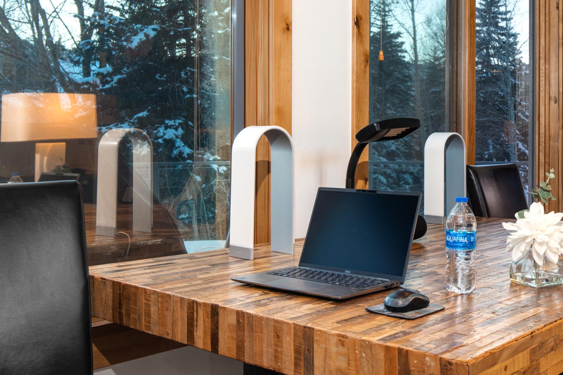 Desk conveniently located in the living room for computer workstation with great mountain views!