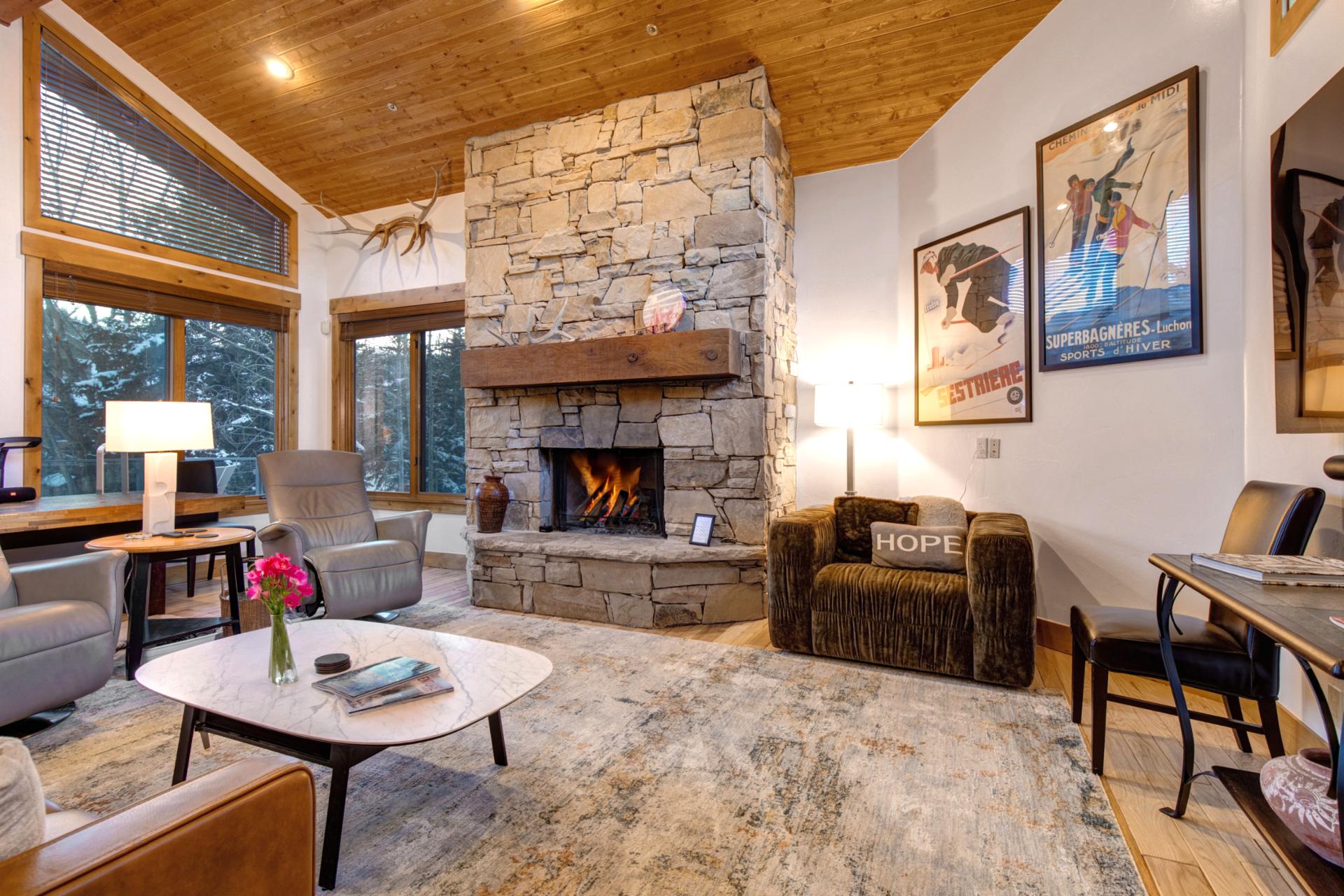 Welcome to your home away from home! Rock fireplace with plenty of seating options to gather around