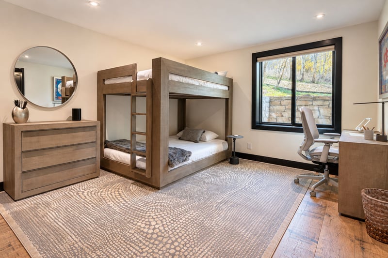 Located on the lower main entrance level is a bunk bedroom, full over full.