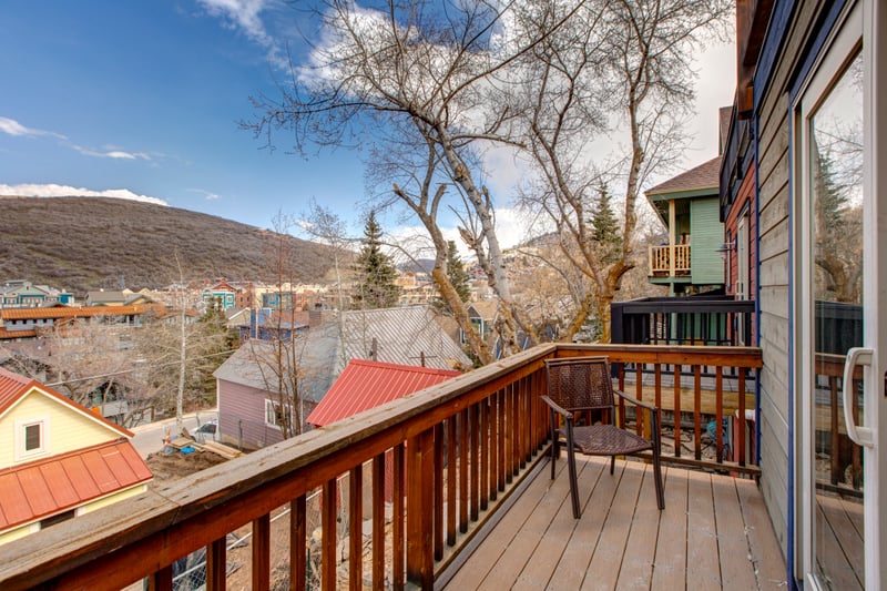 Step onto your private deck with peaceful mountain views and fresh alpine air.
