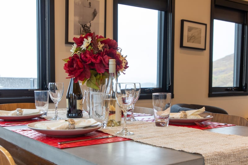 Dining room at Old Town Slopeside Retreat PEA-1114 — mountain views through picture windows set the scene for every family meal PEA-1114