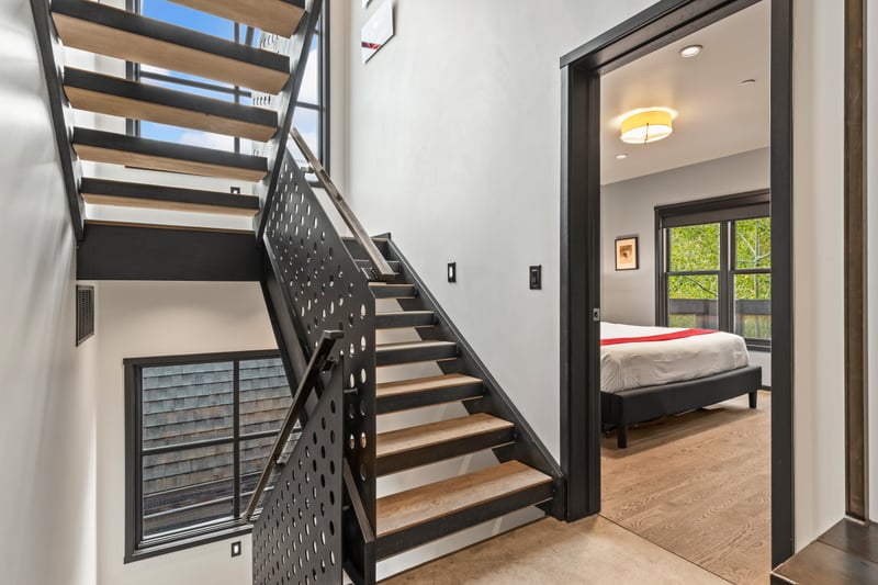 Split-level layout and bedroom access from central staircase. PEA-1114