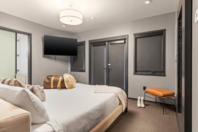 Your primary suite features a King bed, Smart TV, and ensuite bath for ultimate comfort. PEA-1114