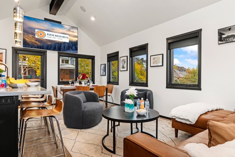 Eclectic art and cozy seating bring a unique personality to this vibrant living space. PEA-1114