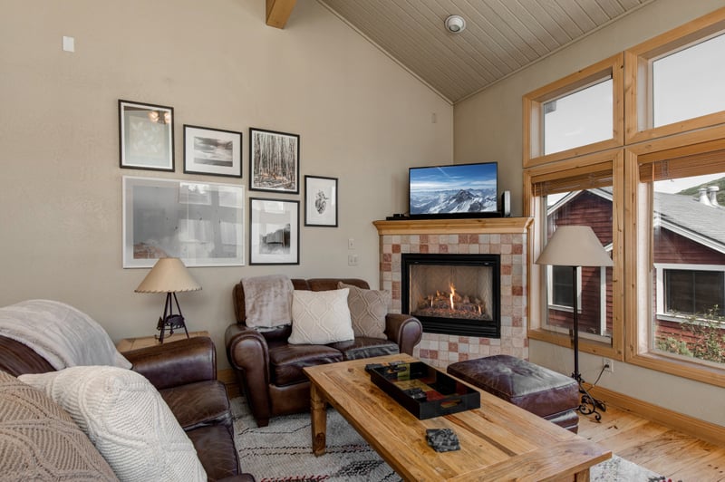 View of the living room showcases the open-concept layout, perfect for movie nights or game time.