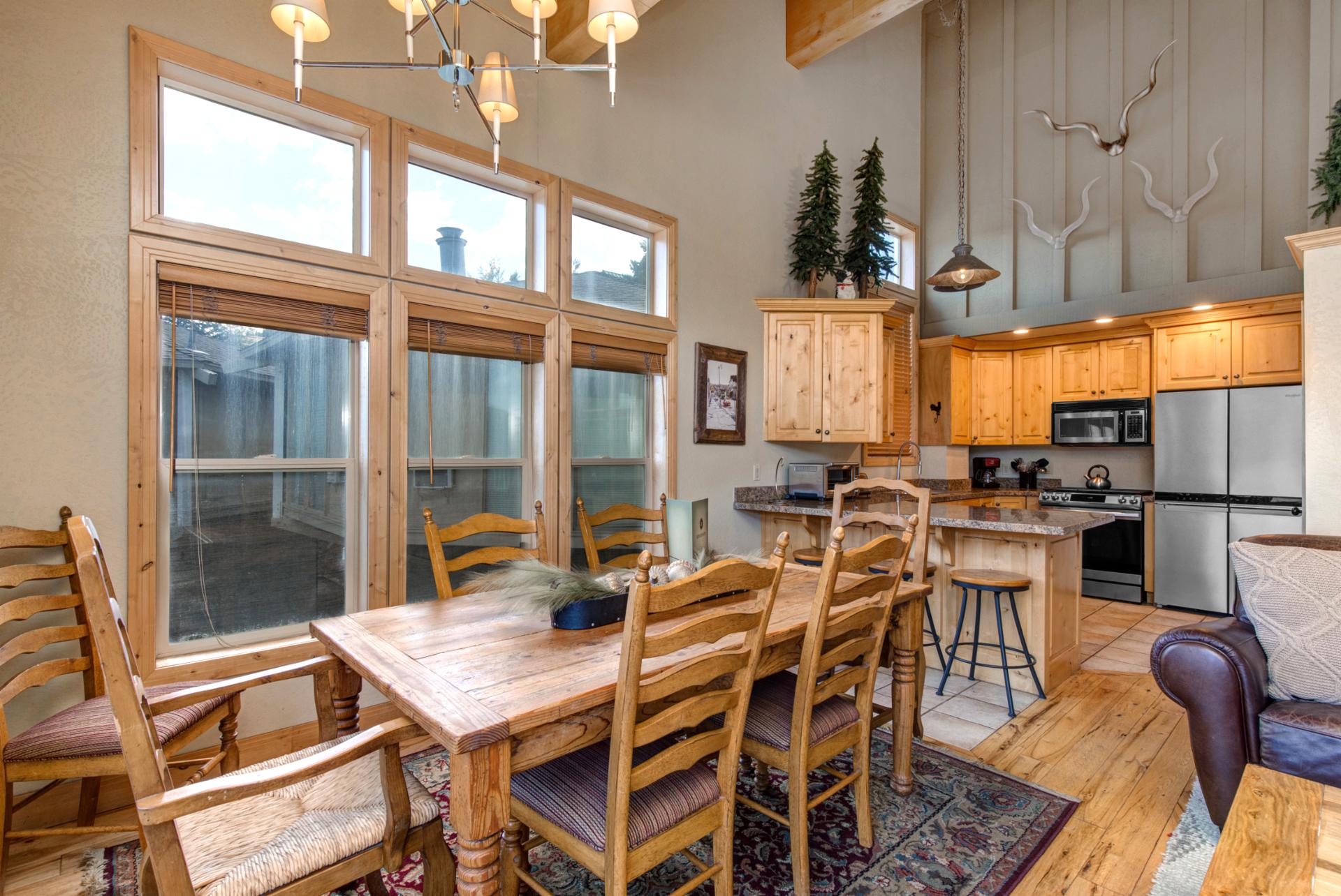 Share meals and stories at your dining table for six, with views and natural light streaming through the windows.