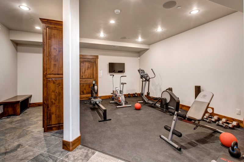 Stay on track in the home gym with free weights, yoga mats, and cardio machines.