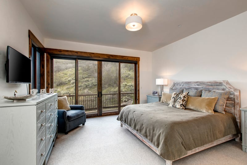 Guest Bedroom features a King bed, mountain views, and easy access to a private bath.