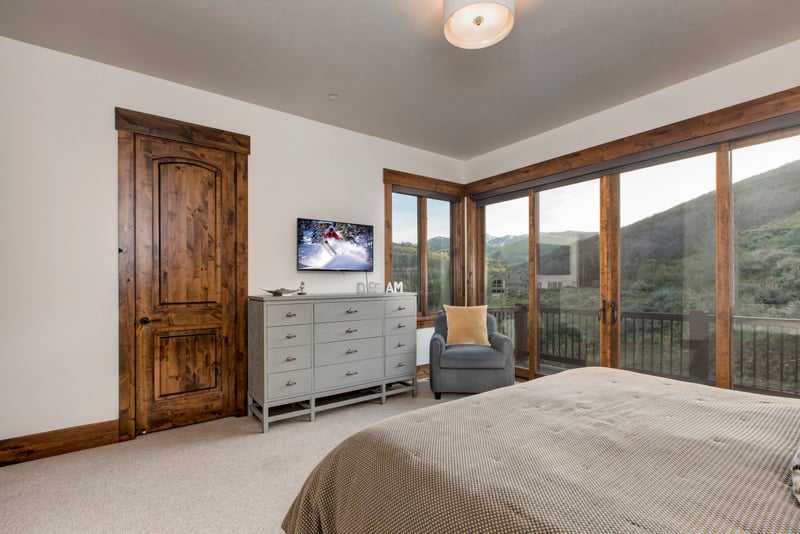 Another look at Guest Bedroom with cozy bedding and natural light.