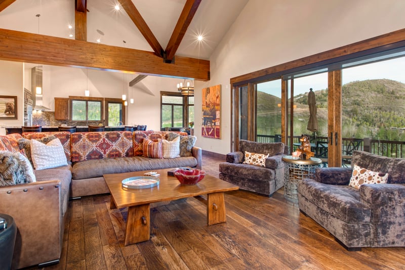 The open-plan layout keeps everyone connected, whether lounging, dining, or prepping meals.