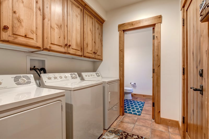Laundry setup ensures easy clean-up after days on the slopes.