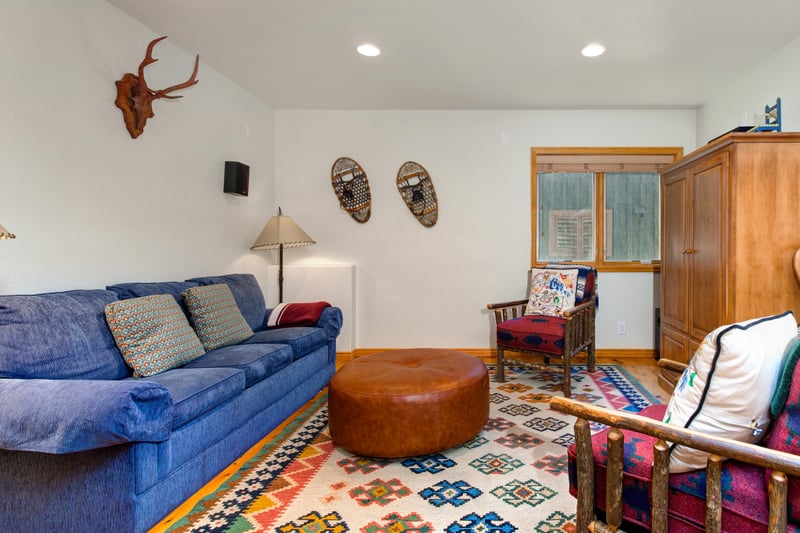Another look at Guest Bedroom with flexible sleeping space and rustic lounge vibes.