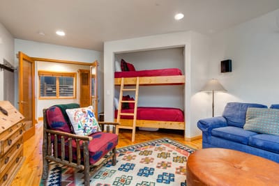 Guest Bedroom 5 features a Twin bunk bed and Queen sofa sleeper on the lower level.
