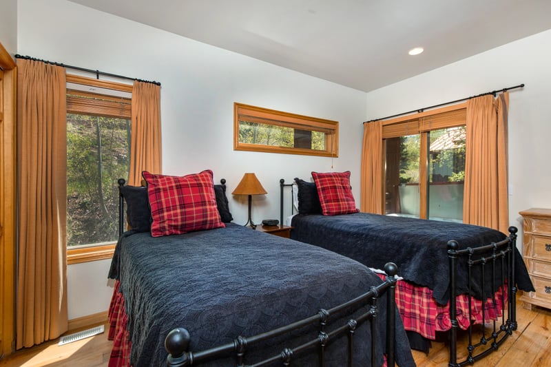Guest Bedroom includes two Twin beds and shares a bath with the second family room.